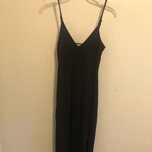 Simple black dress with slit on the side
